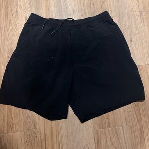 Lululemon Mens XL black athletic shorts - drawstring and lined **has flaw